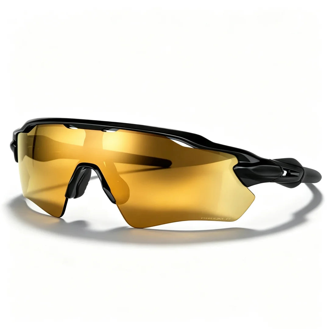 Gold-tinted cycling sunglasses with a black frame shown in a studio setting.