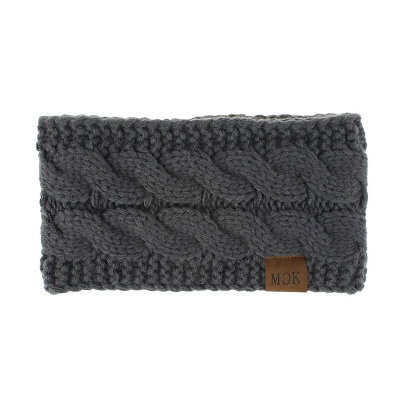 A gray knitted plush winter ear warmer headband.