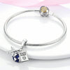 Sterling silver devil's eye charm bracelet with a round charm and a pass port pendant