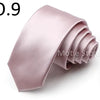 A folded mauve satin neck tie shown in a close-up view.