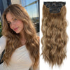 A woman with long, wavy blonde hair is shown next to a clip of synthetic ombre hair extensions.