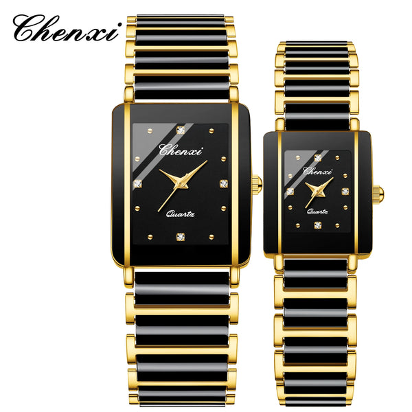 A pair of black and gold ceramic fashion wristwatches with black and gold striped bands.