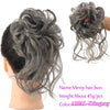 A gray messy hair bun hairstyle shown on a mannequin head and as a loose ponytail.