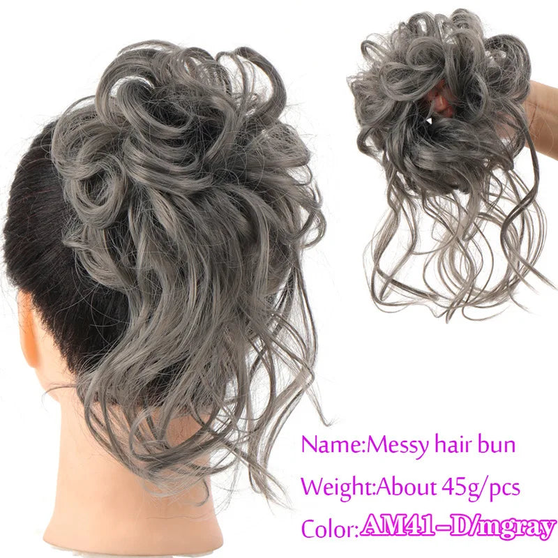 A gray messy hair bun hairstyle shown on a mannequin head and as a loose ponytail.