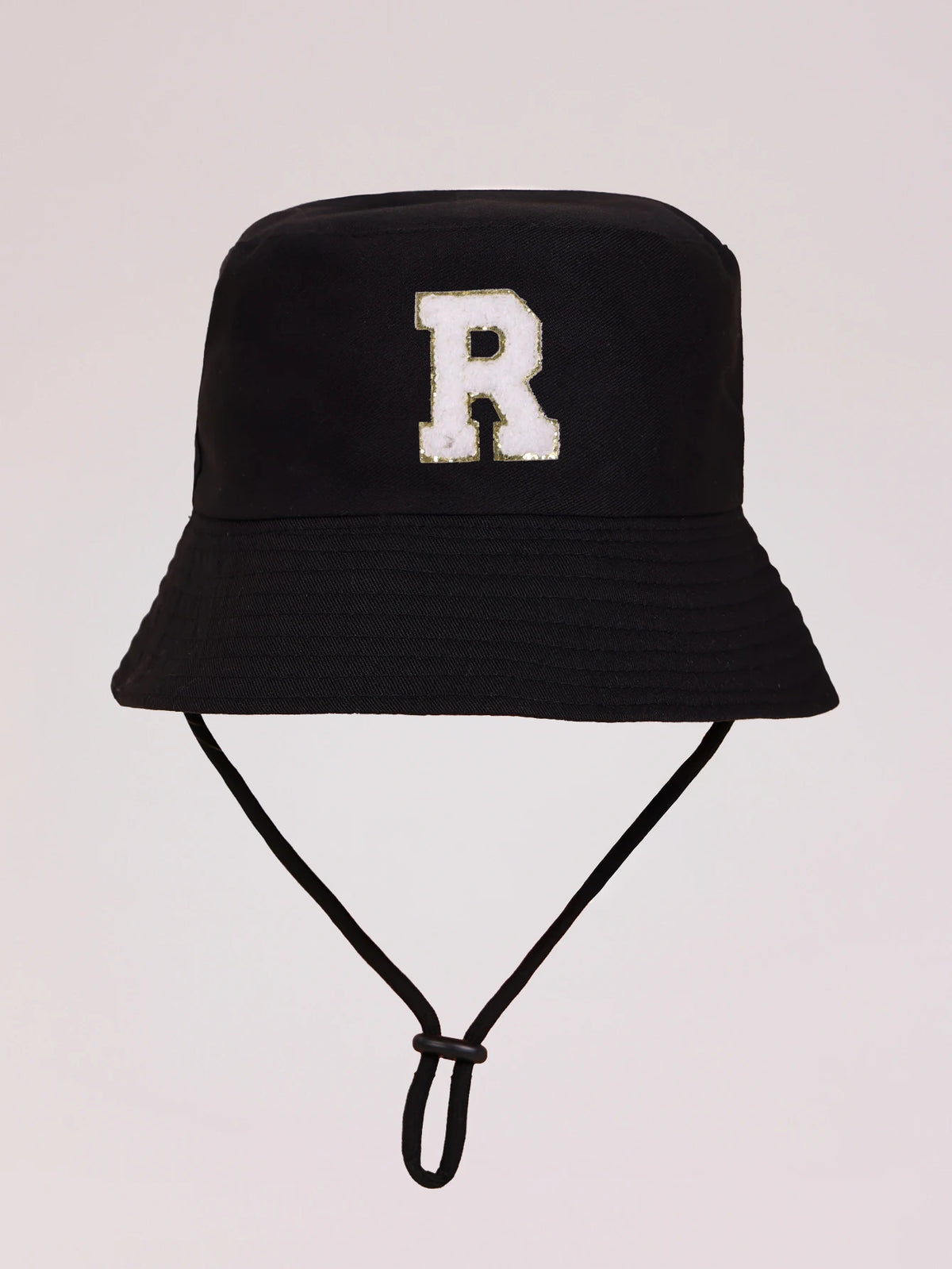Black sun hat with a white letter R embroidered on the front and an adjustable cord.