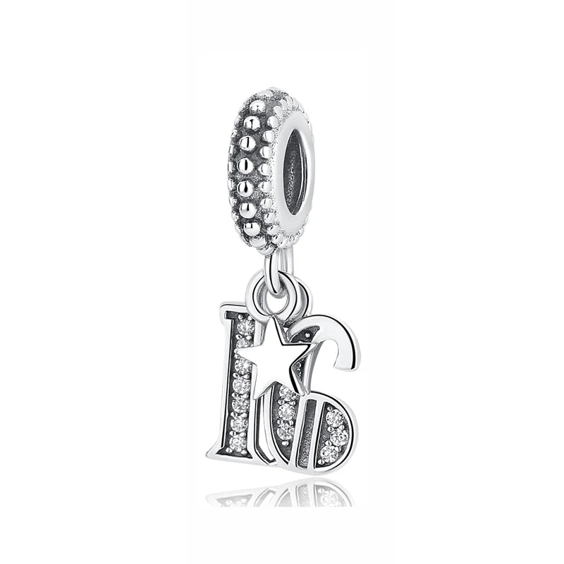 A silver family tree charm necklace featuring a star and a heart design.