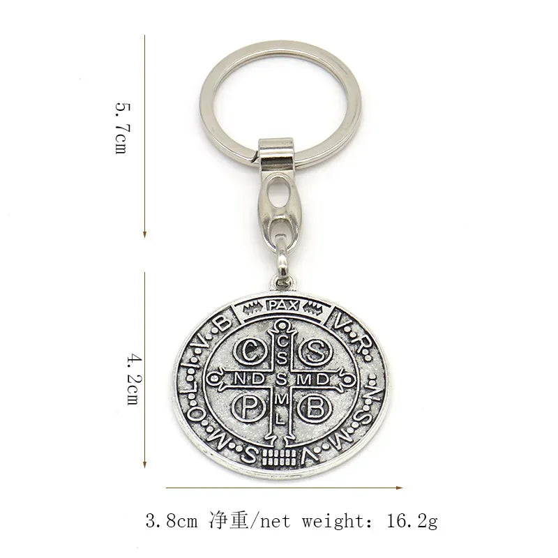 Silver round St. Benedict medallion keychain with a loop and bail