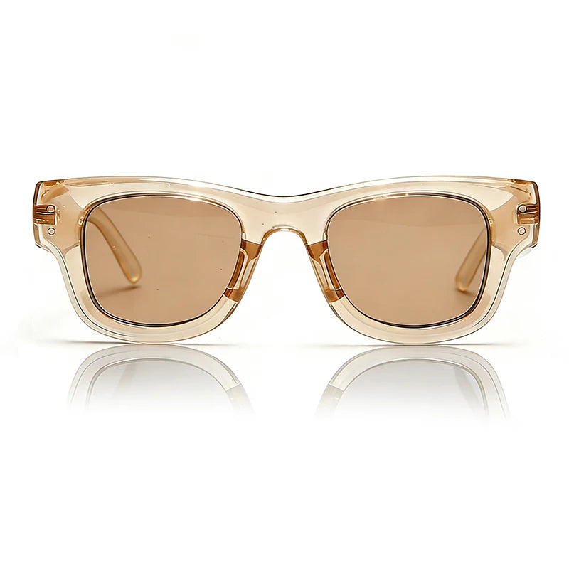 Pair of classic puffer square sunglasses with light amber lenses and clear frames.
