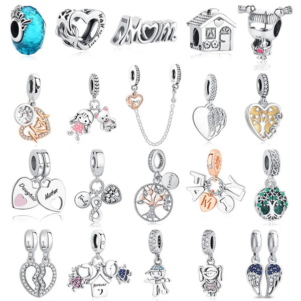 A collection of 925 sterling silver family tree charm jewelry including heart, initial, and various animal charms.