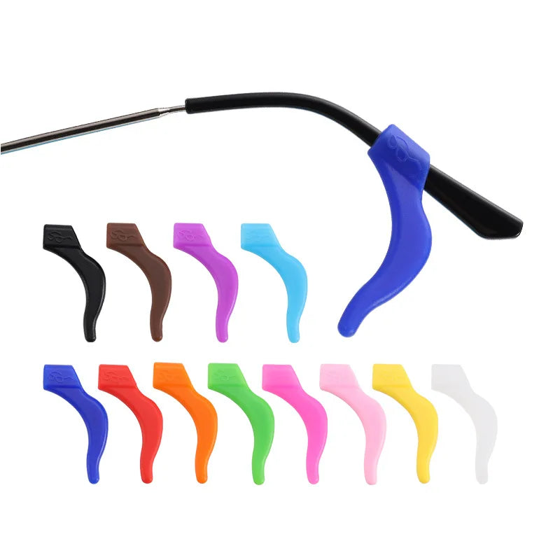 A set of silicone ear hooks in various colors, including blue, purple, green, and yellow, attached to a black handle.