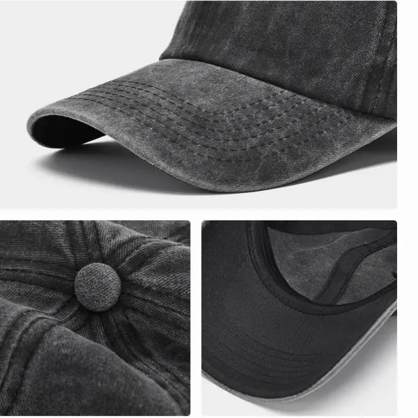 A close-up view of a dark gray washed cotton snapback cap showing the fabric texture and brim.