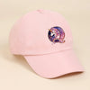 A pink baseball cap featuring a purple and white unicorn design with a rainbow aura.