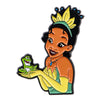 An enamel pin featuring a cartoon depiction of a woman with black hair and a yellow crown, holding a green frog.