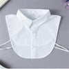 White elegant detachable button-up collar shirt displayed flat on a gray surface.