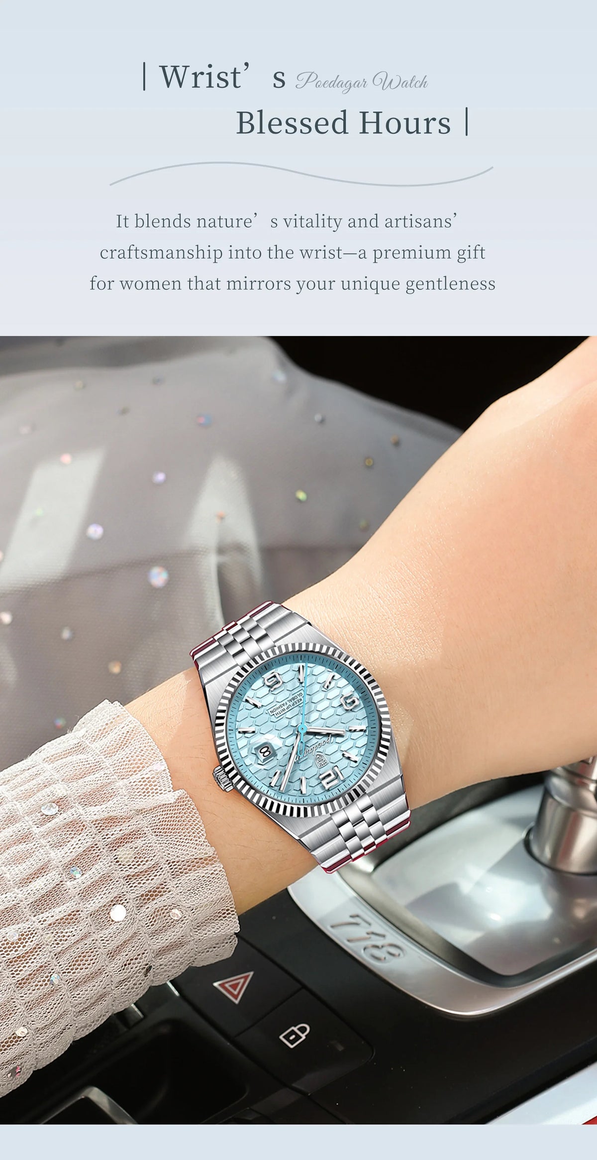 A close-up of a women's quartz wristwatch with a light blue dial and silver bracelet worn on a wrist.