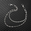 Silver double-layer waist chain accessory with a clasp, displayed against a dark background.