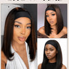 A woman models a black headband wig with brown ombre hair in a straight bob style.