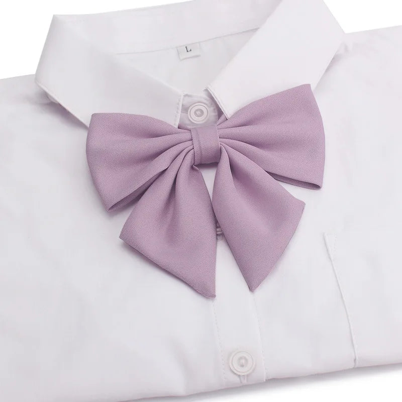 White shirt with a lavender butterfly ribbon tie and collar