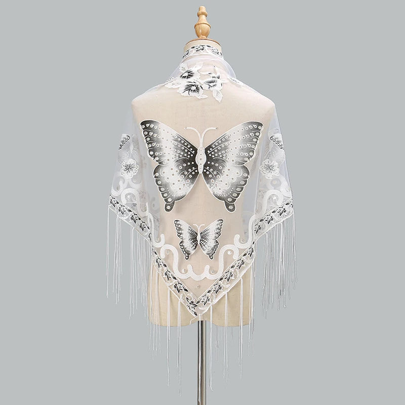 A sheer white lace scarf or shawl featuring printed butterfly motifs displayed on a mannequin.