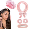 أسطوانات تجعيد وردية وربطات رأس بجانب شعر امرأة.