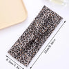 A black and brown leopard print fabric headband is shown flat with measurements.
