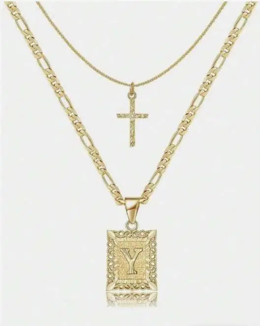 Collier avec pendentif en forme de Y et croix en or sur une chaîne délicate
