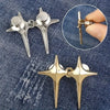 A pair of gold star-shaped decorative waist buckle buttons shown against a dark denim background with an inset showing the si
