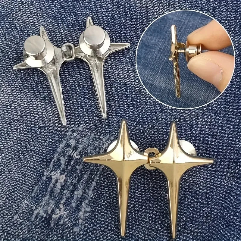 A pair of gold star-shaped decorative waist buckle buttons shown against a dark denim background with an inset showing the si