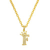 Gold chain necklace with a large initial F pendant featuring a crown design
