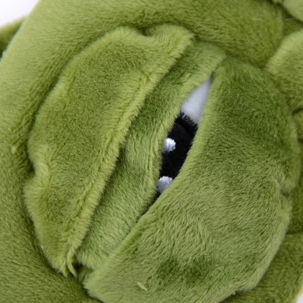 Close-up of a soft green cotton sleep mask showing the interior lining and eye relief design.