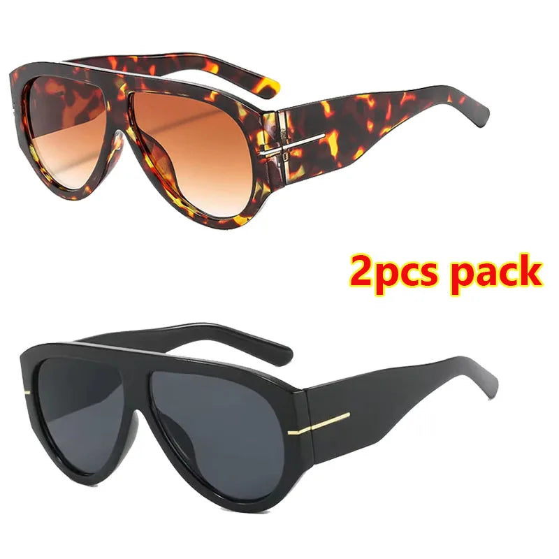 A pair of retro oval sunglasses in a leopard print pattern and a pair of black sunglasses are shown.