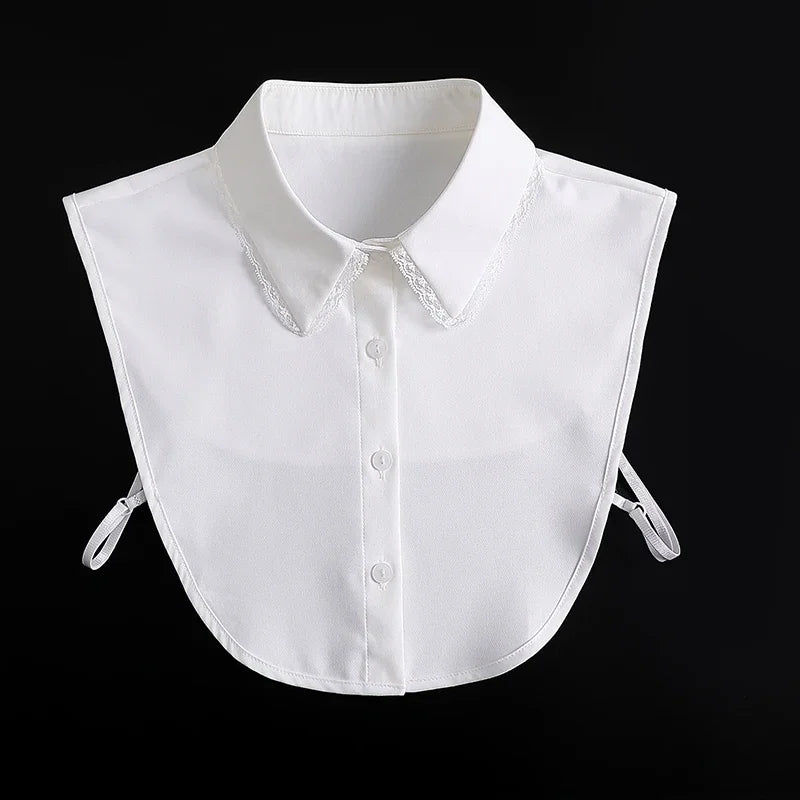 White blouse with a fashionable false collar and detachable neckline, shown flat lay.
