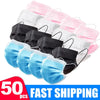 A collection of 50 disposable face masks in various colors including pink, white, black, and blue.