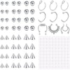 A collection of silver replacement fake eyebrow and lip labret studs in various shapes and sizes.
