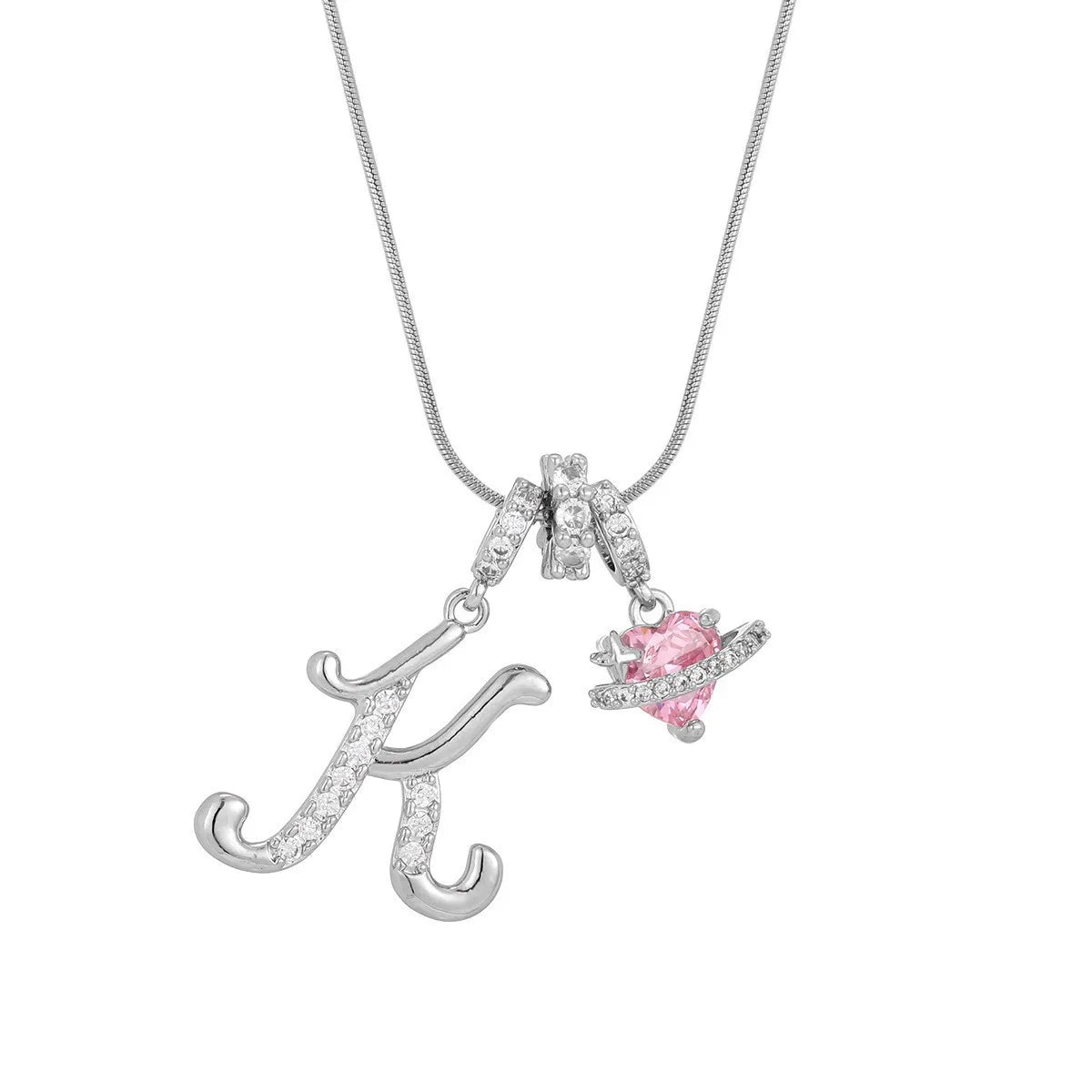 Silver letter K pendant necklace with a pink gemstone charm