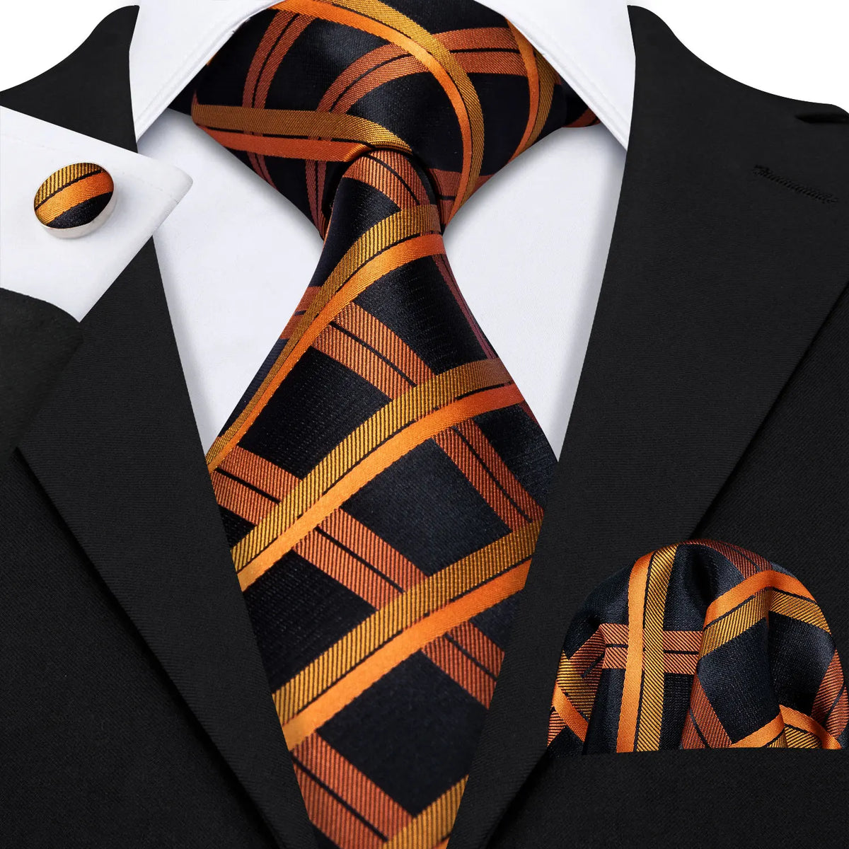 A black and orange striped silk jacquard tie worn with a black suit jacket and white shirt.