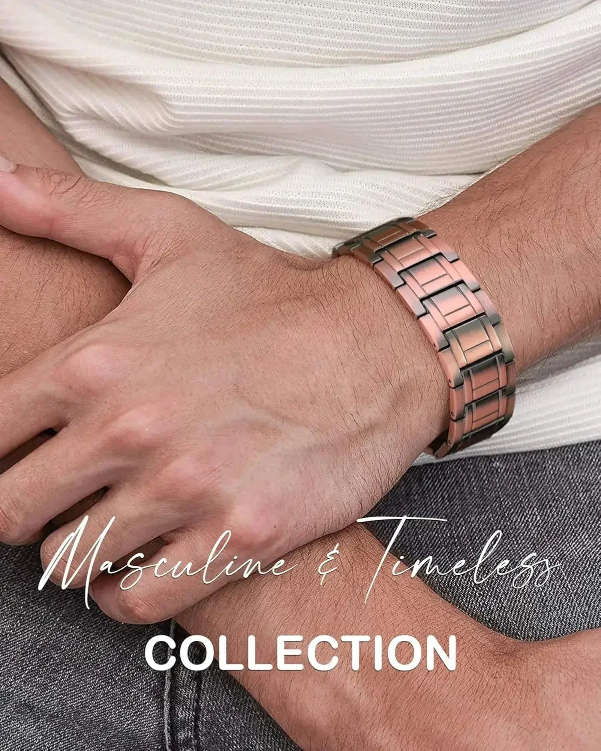 A close-up of a man's wrist wearing a rose gold copper magnetic bracelet against a white shirt and dark pants.