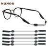 A pair of black, adjustable silicone eyewear straps for glasses and sunglasses.