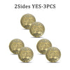 Three vintage antique bronze decision coins stamped with the word YES
