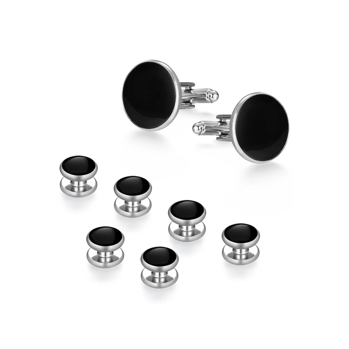 Un ensemble d'elegant boutons de manchette noirs et de serre-cravate sur fond blanc.