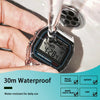 A hand holds a vintage digital wristwatch with an alarm feature, demonstrating its 30m waterproof resistance.