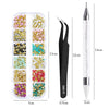 A set of 4 rhinestone nail art decorations packaged in a clear tube with an applicator.