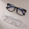 A pair of vintage square anti-blue light eyeglasses with black frames and blue tinted lenses.