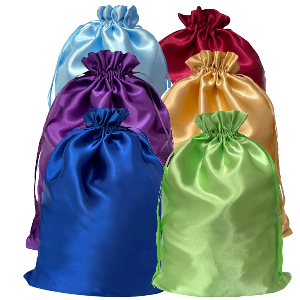 A collection of five satin drawstring storage bags in various colors including blue, purple, gold, and green.