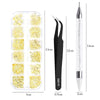A set of 4 rhinestone nail art decorations packaged in a clear plastic container alongside an applicator tool.