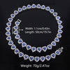 A set of sparkling heart rhinestone necklaces and bracelets featuring blue stones, shown against a dark background.