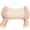 Hands holding a sheer beige wig cap or hair netting fabric.