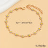 Gold enamel daisy chain anklet measuring 8.27 inches and 5 cm