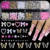 A collection of pink and white butterfly bow nail charms and glitter accents for manicures.
