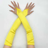 A pair of bright yellow satin fingerless gloves crossed in an 'X' shape.